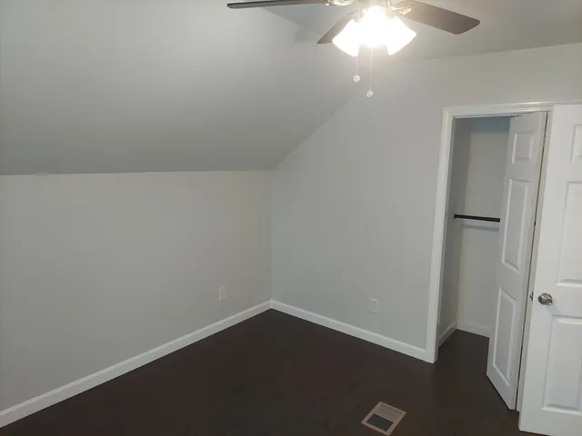 a bathroom with a sink a mirror and vanity
