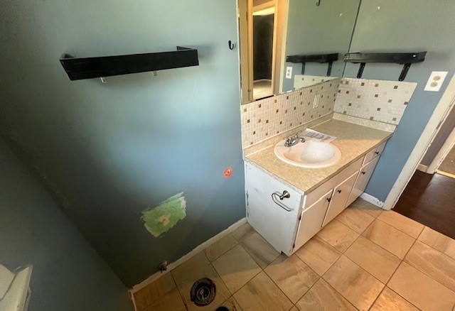 3915 Neeley Avenue Decatur, IL 62526 - Photo 14 of 19 a bathroom with a sink a mirror and shower