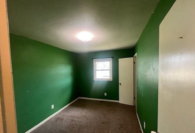3915 Neeley Avenue Decatur, IL 62526 - Photo 10 of 19 an empty room with closet and windows