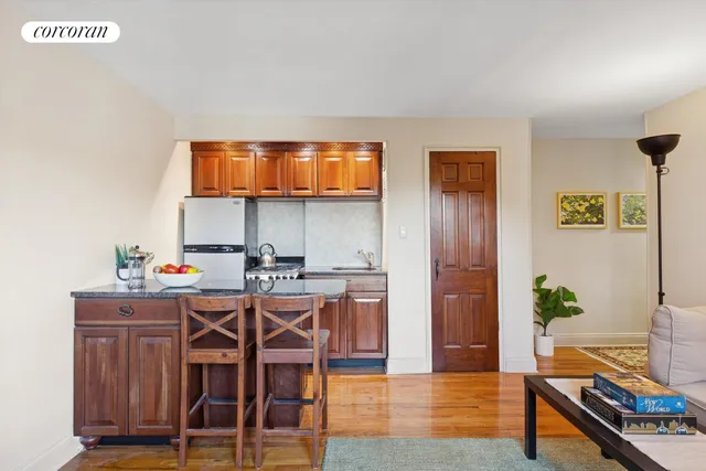 a view of a workspace with furniture