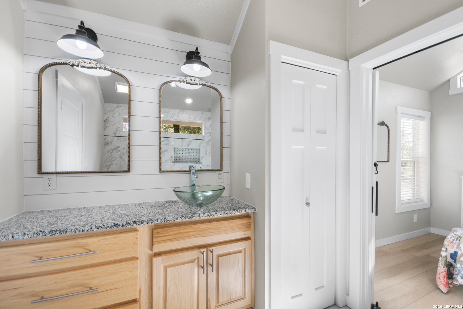 292 Fossil Ridge Boerne, TX 78006 - Photo 102 of 144 a bathroom with a granite countertop sink mirror and vanity