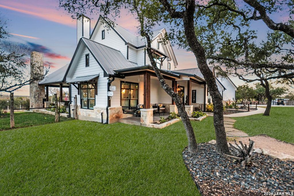 292 Fossil Ridge Boerne, TX 78006 - Photo 126 of 144 a view of a house with backyard porch and sitting area