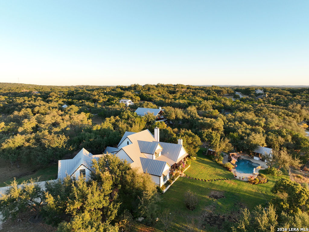 292 Fossil Ridge Boerne, TX 78006 - Photo 142 of 144 an aerial view of a house with a yard