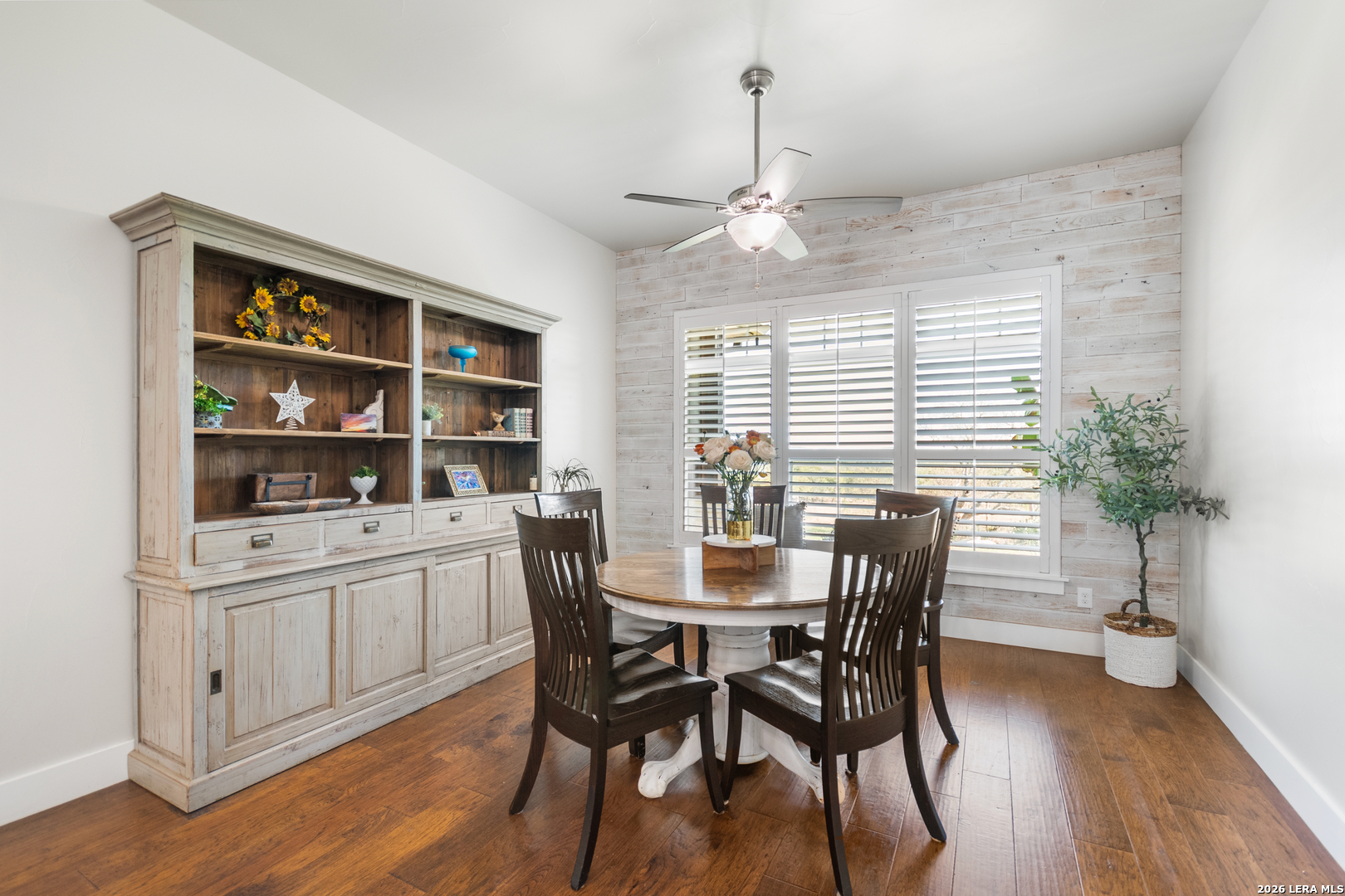 292 Fossil Ridge Boerne, TX 78006 - Photo 26 of 144 a view of a dining room with furniture window and wooden floor