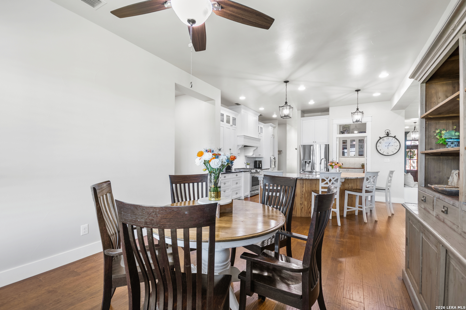 292 Fossil Ridge Boerne, TX 78006 - Photo 27 of 144 a view of a dining room with furniture and wooden floor