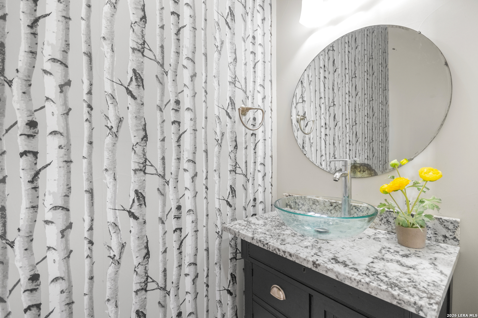 292 Fossil Ridge Boerne, TX 78006 - Photo 37 of 144 a bathroom with a granite countertop sink and a mirror