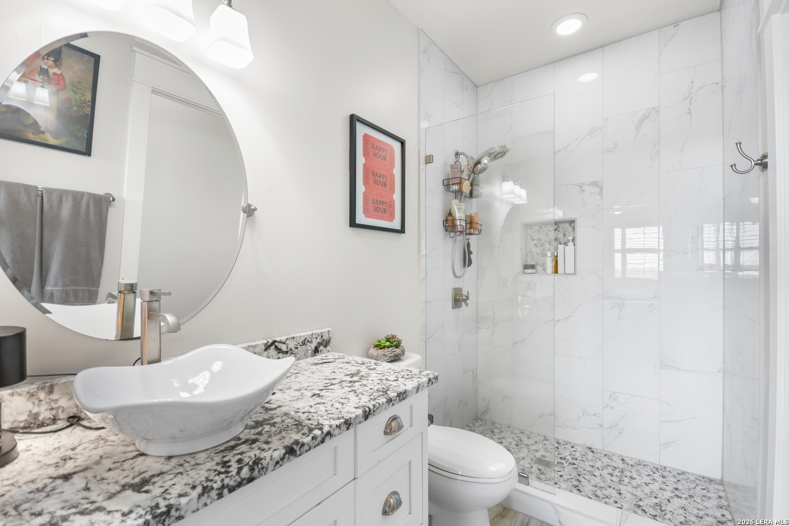292 Fossil Ridge Boerne, TX 78006 - Photo 46 of 144 a bathroom with a granite countertop sink mirror vanity and toilet