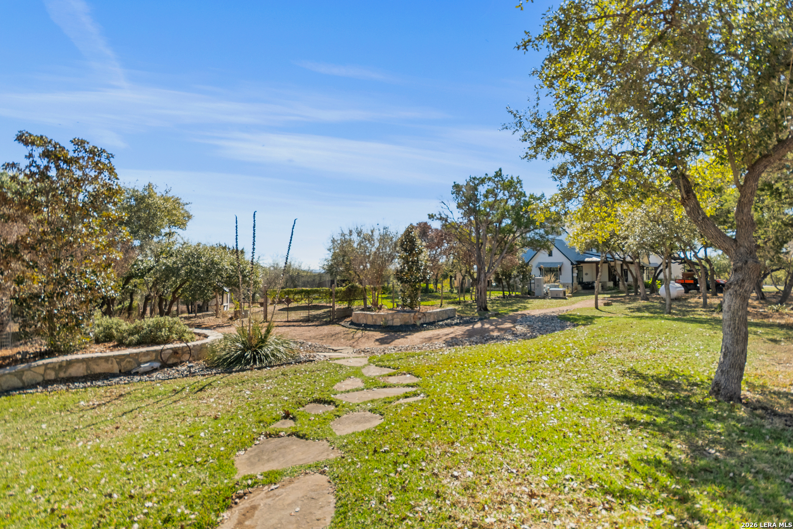 292 Fossil Ridge Boerne, TX 78006 - Photo 61 of 144 a view of a swimming pool with an outdoor space and seating area