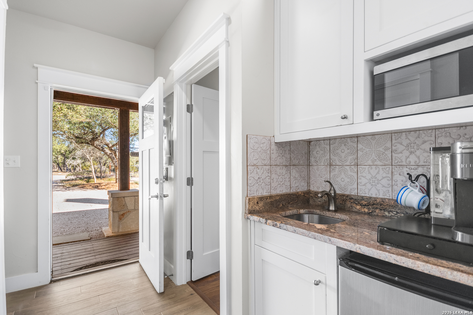 292 Fossil Ridge Boerne, TX 78006 - Photo 69 of 144 a kitchen with stainless steel appliances granite countertop a sink and a cabinets