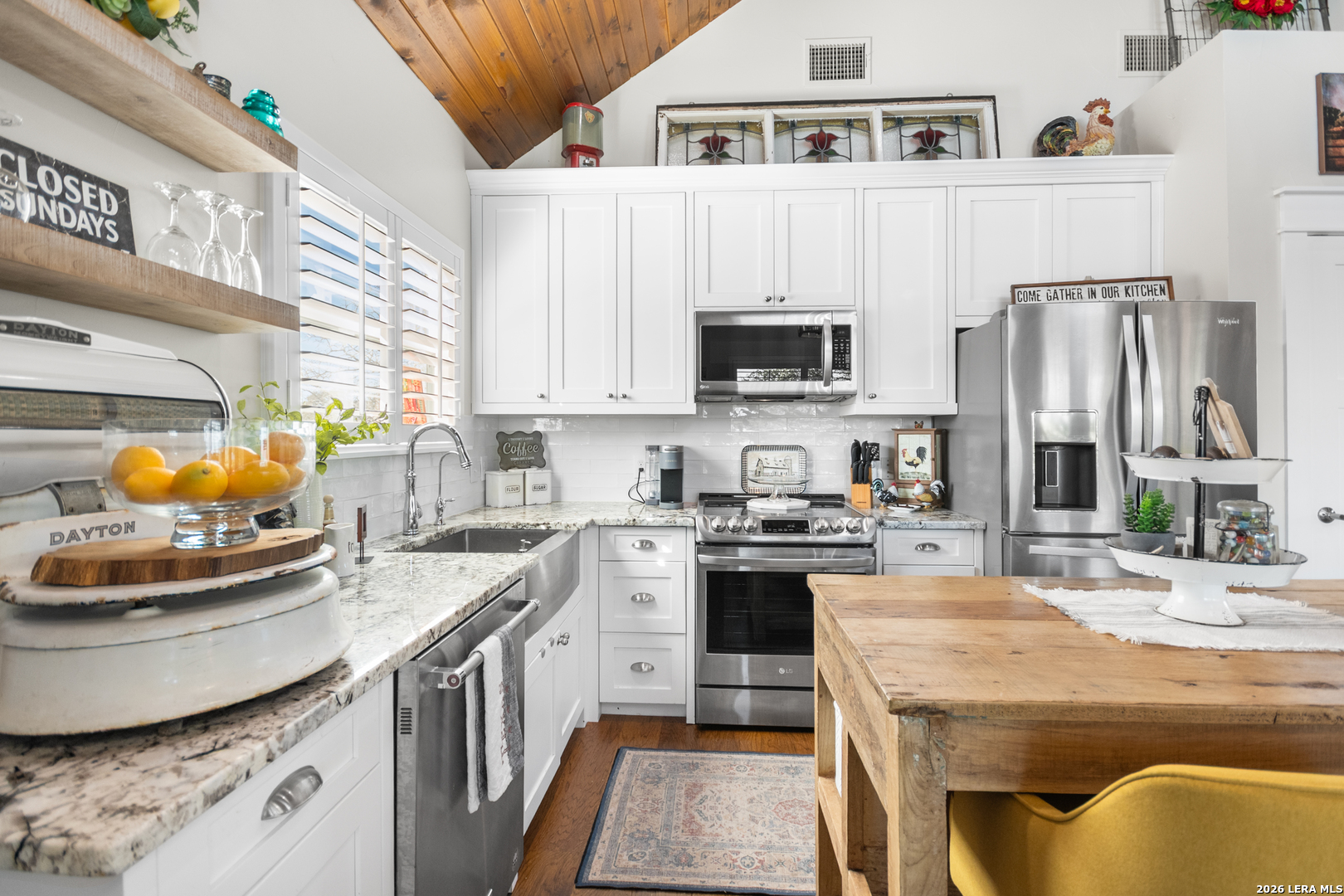 292 Fossil Ridge Boerne, TX 78006 - Photo 75 of 144 a kitchen with stainless steel appliances granite countertop a sink a stove and a refrigerator