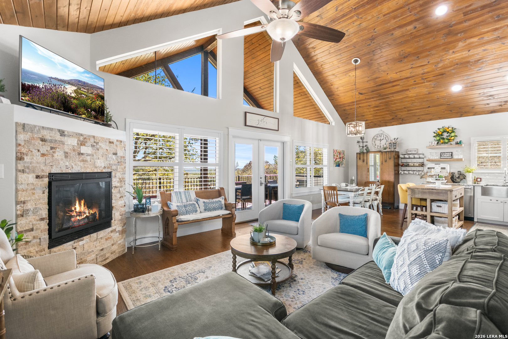 292 Fossil Ridge Boerne, TX 78006 - Photo 79 of 144 a living room with furniture a fireplace and a flat screen tv