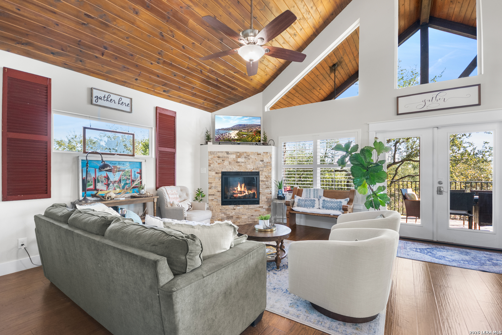 292 Fossil Ridge Boerne, TX 78006 - Photo 80 of 144 a living room with furniture a fireplace and a large window