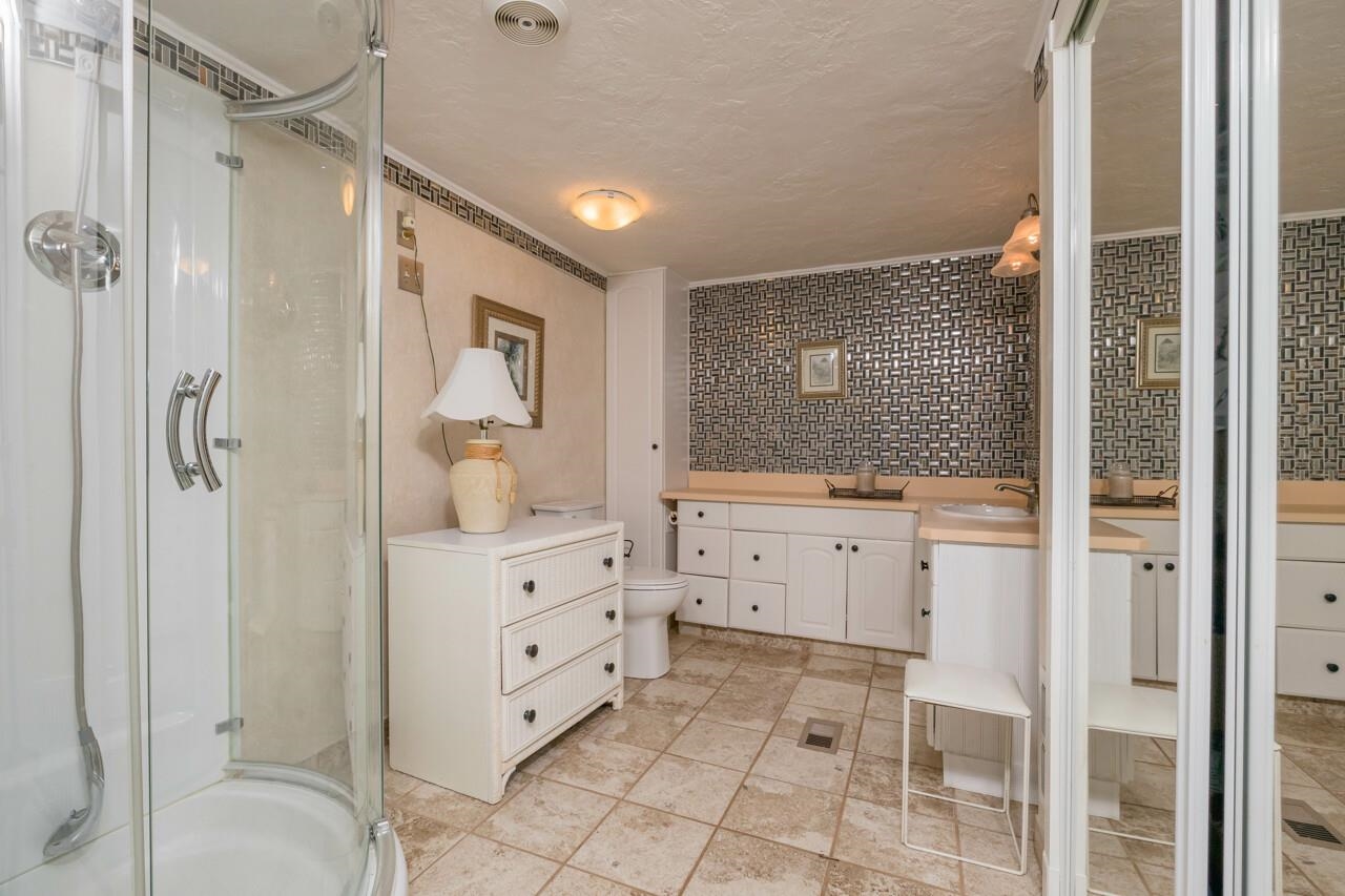 248 Majorca Road St. Augustine, FL 32080 - Photo 16 of 48 a bathroom with a shower and a sink