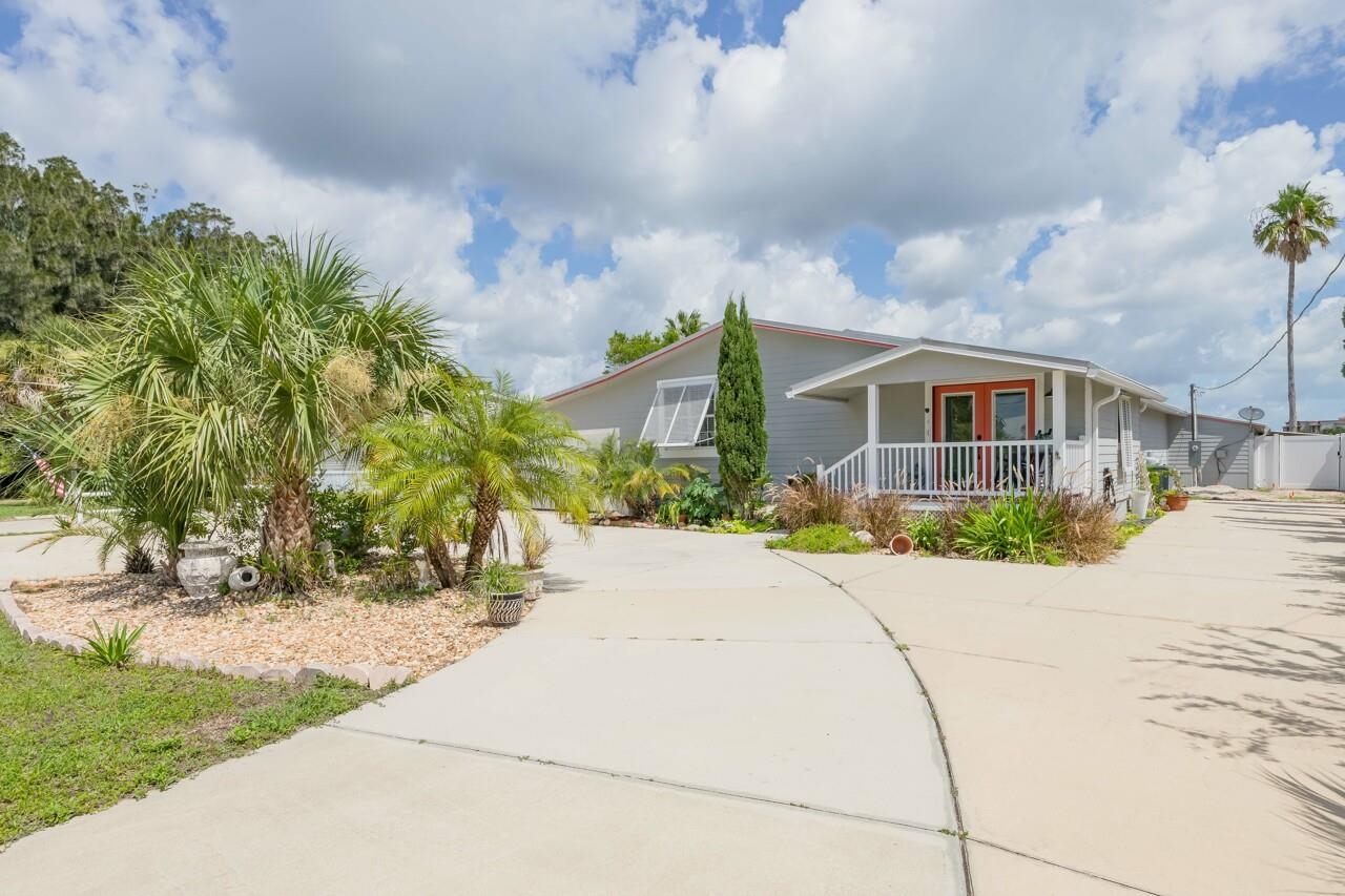 248 Majorca Road St. Augustine, FL 32080 - Photo 3 of 48 a front view of house with yard