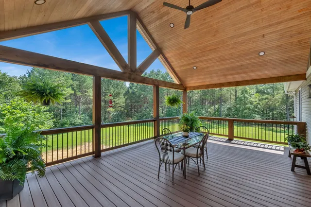 a view of a patio with wooden floor