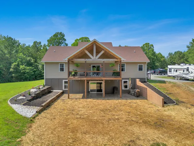 a view of a park with large trees
