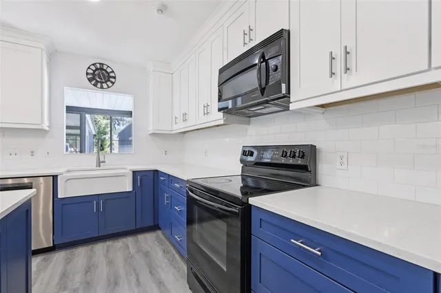 a bed room with furniture and a flat screen tv