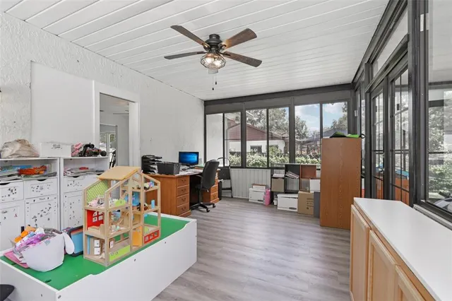 a view of a backyard with a swimming pool
