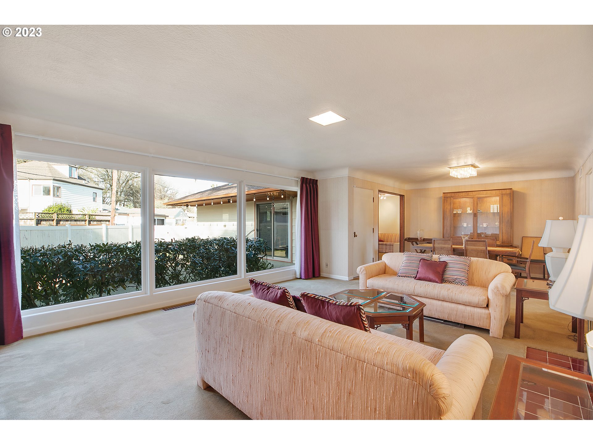2316 Washington Way Longview, WA 98632 - Photo 2 of 31 a living room with furniture and large windows