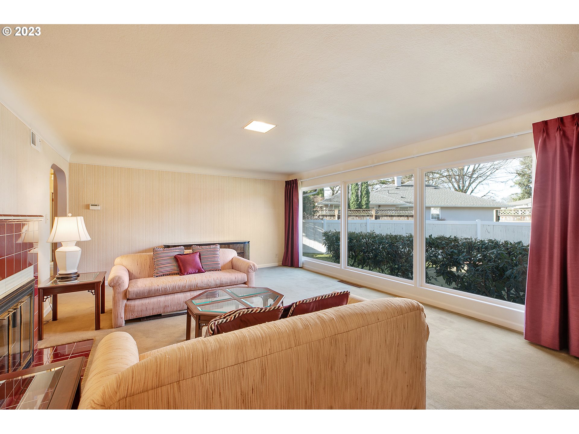 2316 Washington Way Longview, WA 98632 - Photo 5 of 31 a living room with furniture and a floor to ceiling window