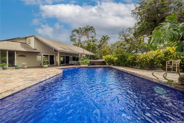a view of a house with a swimming pool