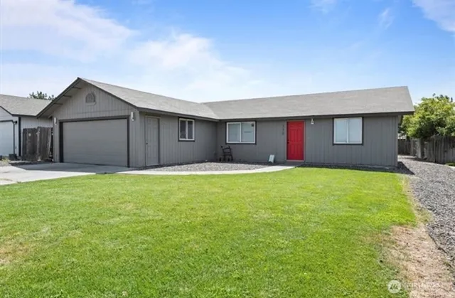 a house view with a backyard space