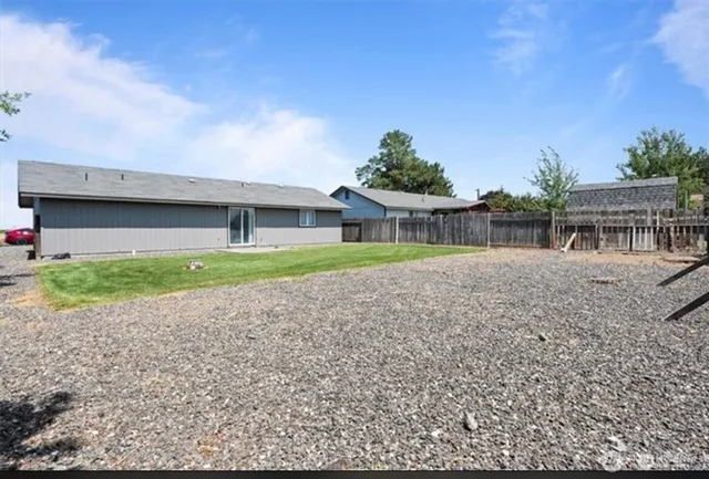 a view of house with a garden