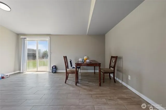 a workspace with furniture and a window