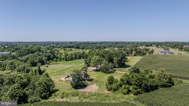 a view of a lake with a yard