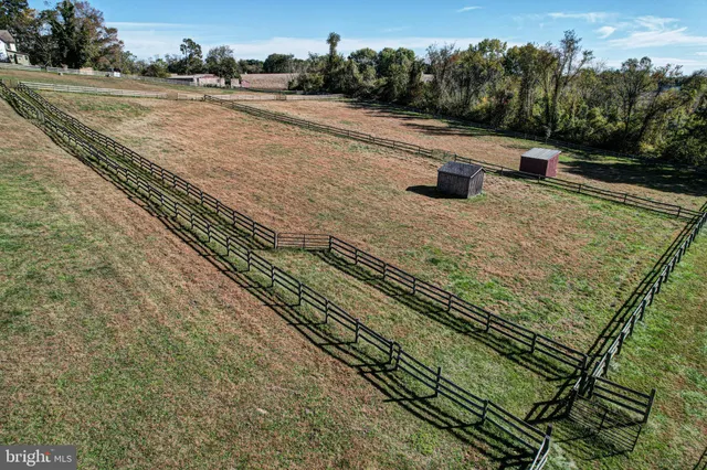 a kitchen with stainless steel appliances granite countertop a stove sink and cabinets