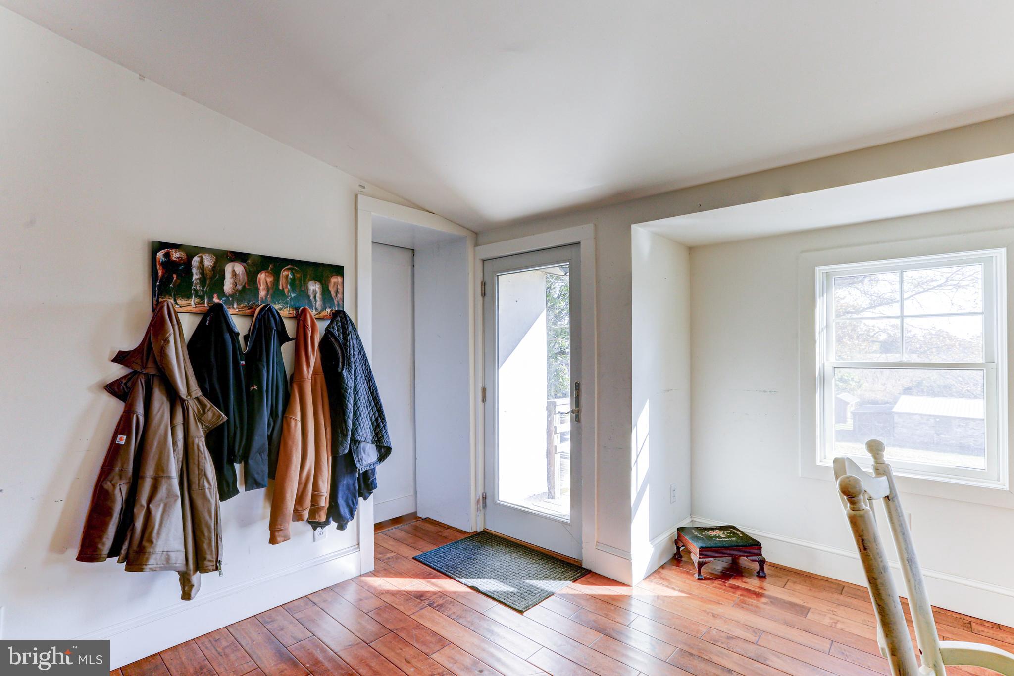 1427 Flint Hill Road Landenberg, PA 19350 - Photo 53 of 85 a view of walk in closet with clothes and shoes