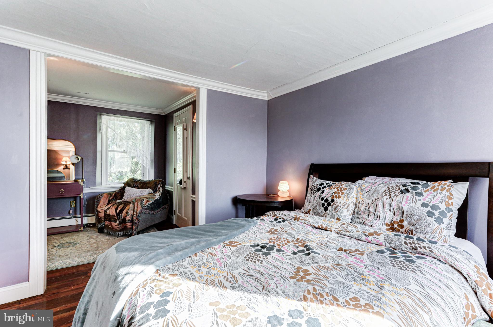 1427 Flint Hill Road Landenberg, PA 19350 - Photo 69 of 85 a bedroom with a large bed and a large mirror