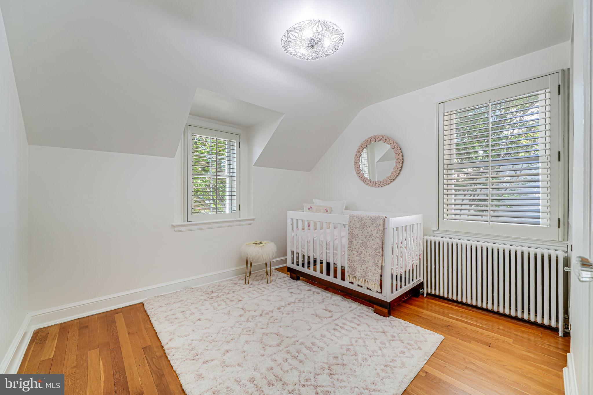 4817 Chevy Chase Boulevard Chevy Chase, MD 20815 - Photo 22 of 78 a view of a room with furniture and wooden floor