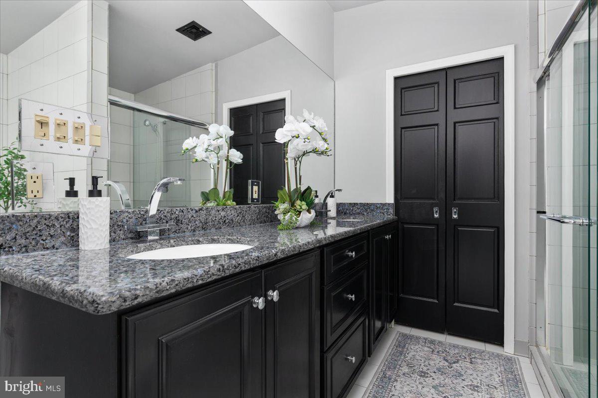 4817 Chevy Chase Boulevard Chevy Chase, MD 20815 - Photo 30 of 78 Blue pearl granite countertop & designer fixtures