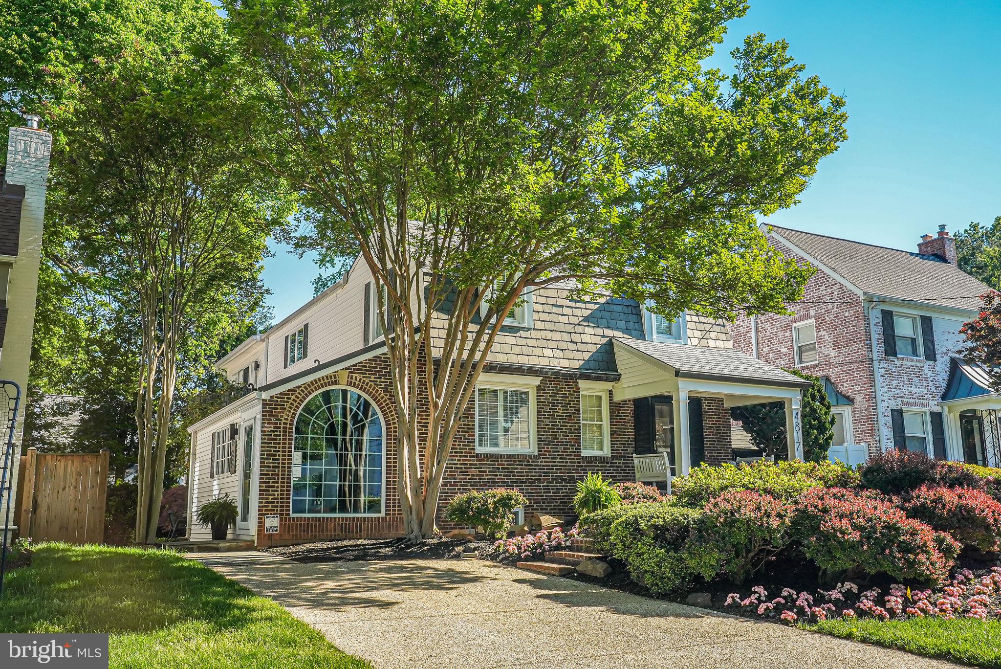 4817 Chevy Chase Boulevard Chevy Chase, MD 20815 - Photo 3 of 78 front view of a house with a yard