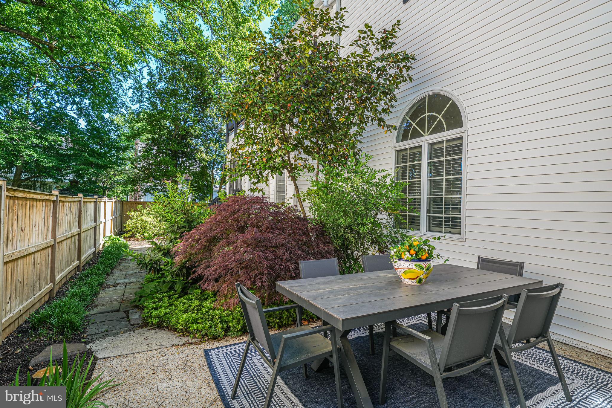 4817 Chevy Chase Boulevard Chevy Chase, MD 20815 - Photo 46 of 78 a view of outdoor dining space with a table and chair
