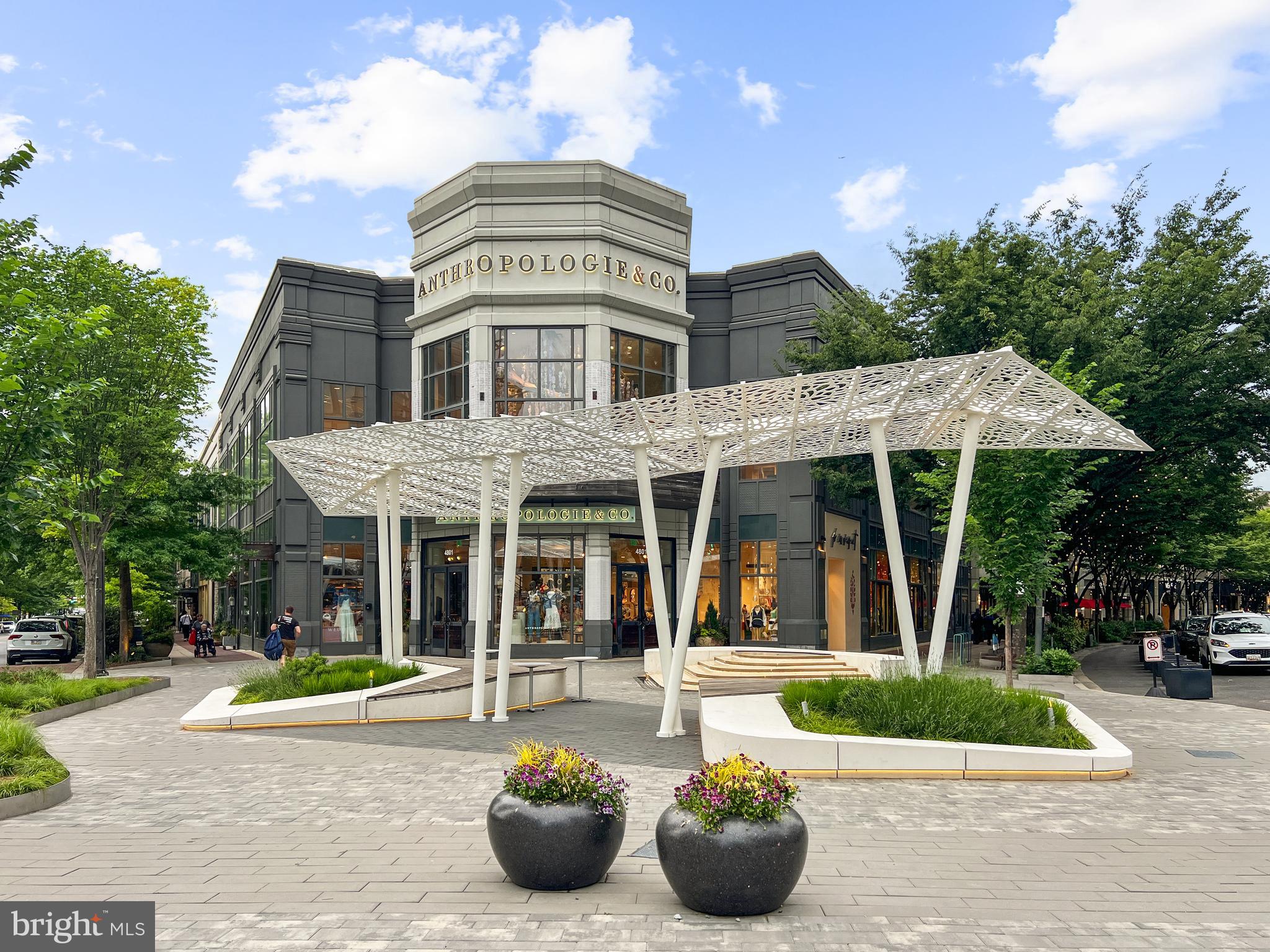4817 Chevy Chase Boulevard Chevy Chase, MD 20815 - Photo 60 of 78 a front view of a house with porch and garden
