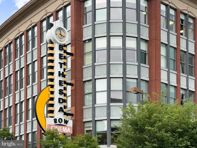 a view of a building with a street