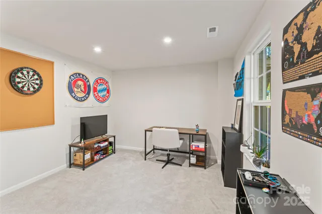 a room with furniture and a flat screen tv