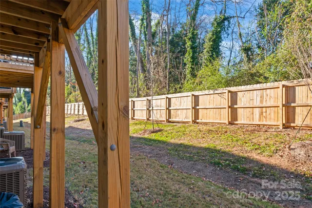 a view of outdoor space and backyard