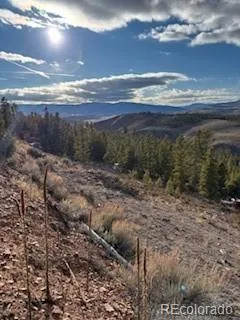 a view of an ocean and a yard