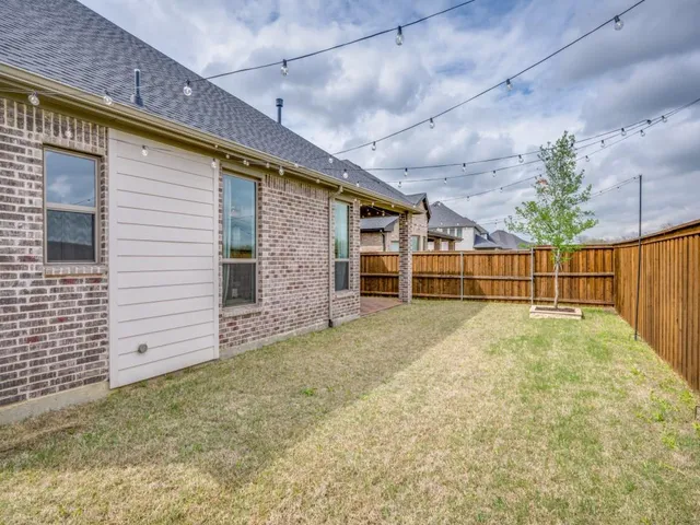 a view of a house with a garage