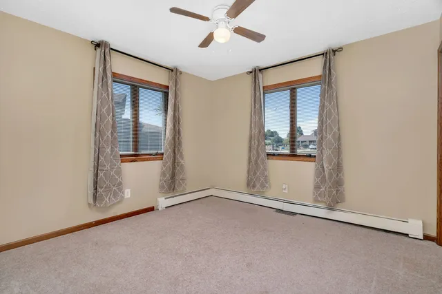 a view of entryway with wooden floor and stairs