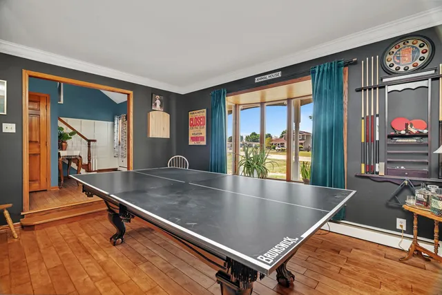 a living room with a bed and furniture