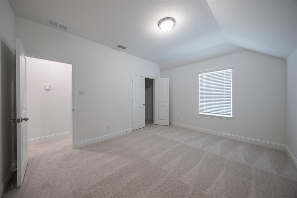 102 National Court Forney, TX 75126 - Photo 20 of 26 a view of an empty room with a window