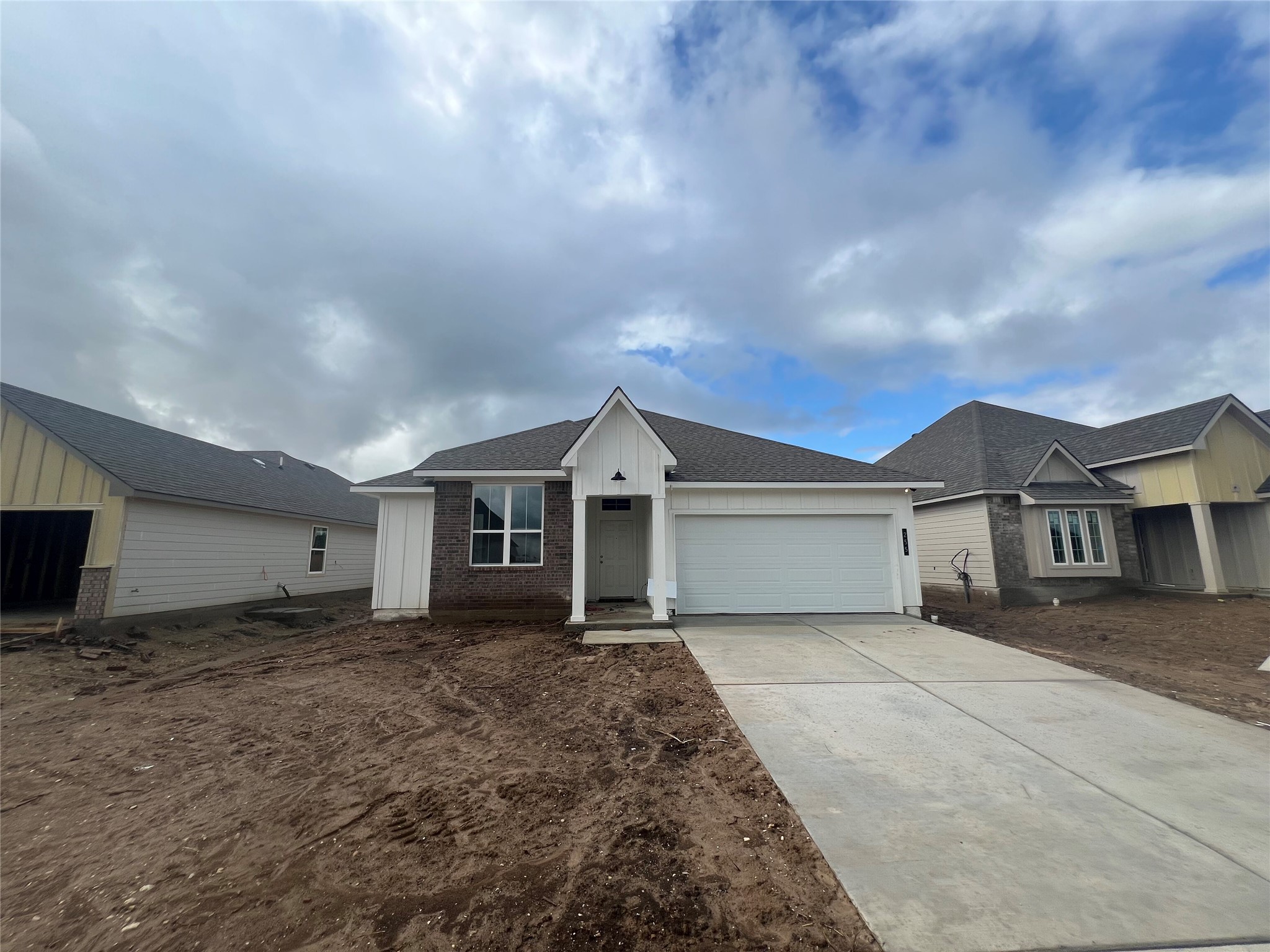 255 Gus Loop Georgetown, TX 78626 - Photo 1 of 24 A new construction home with brick and siding facade awaits your personal touch.