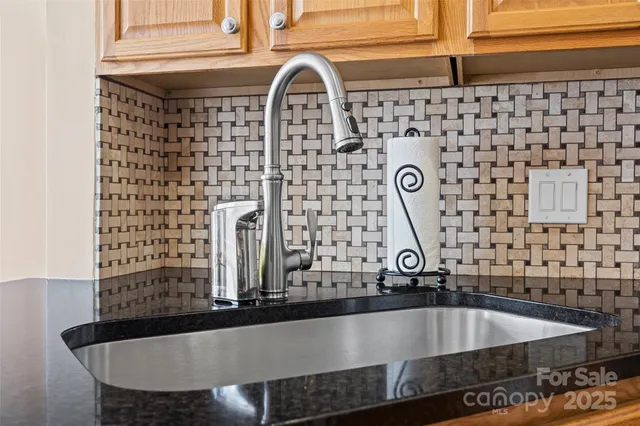 a close view of sink and mirror