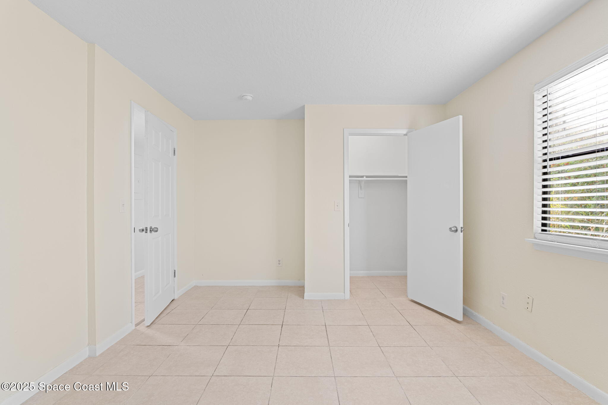 1870 Agora Circle Southeast, Unit 103 Palm Bay, FL 32909 - Photo 16 of 18 Bedroom 2