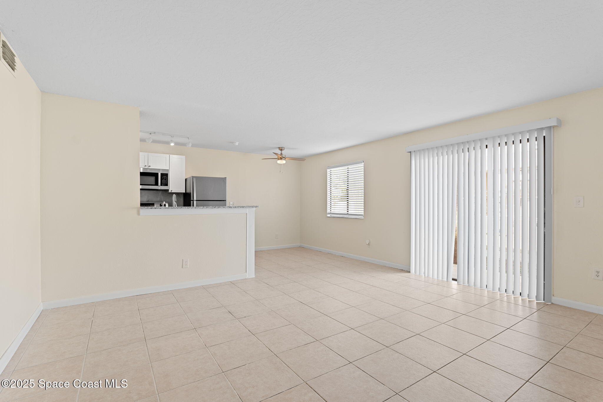 1870 Agora Circle Southeast, Unit 103 Palm Bay, FL 32909 - Photo 3 of 18 View from Entry