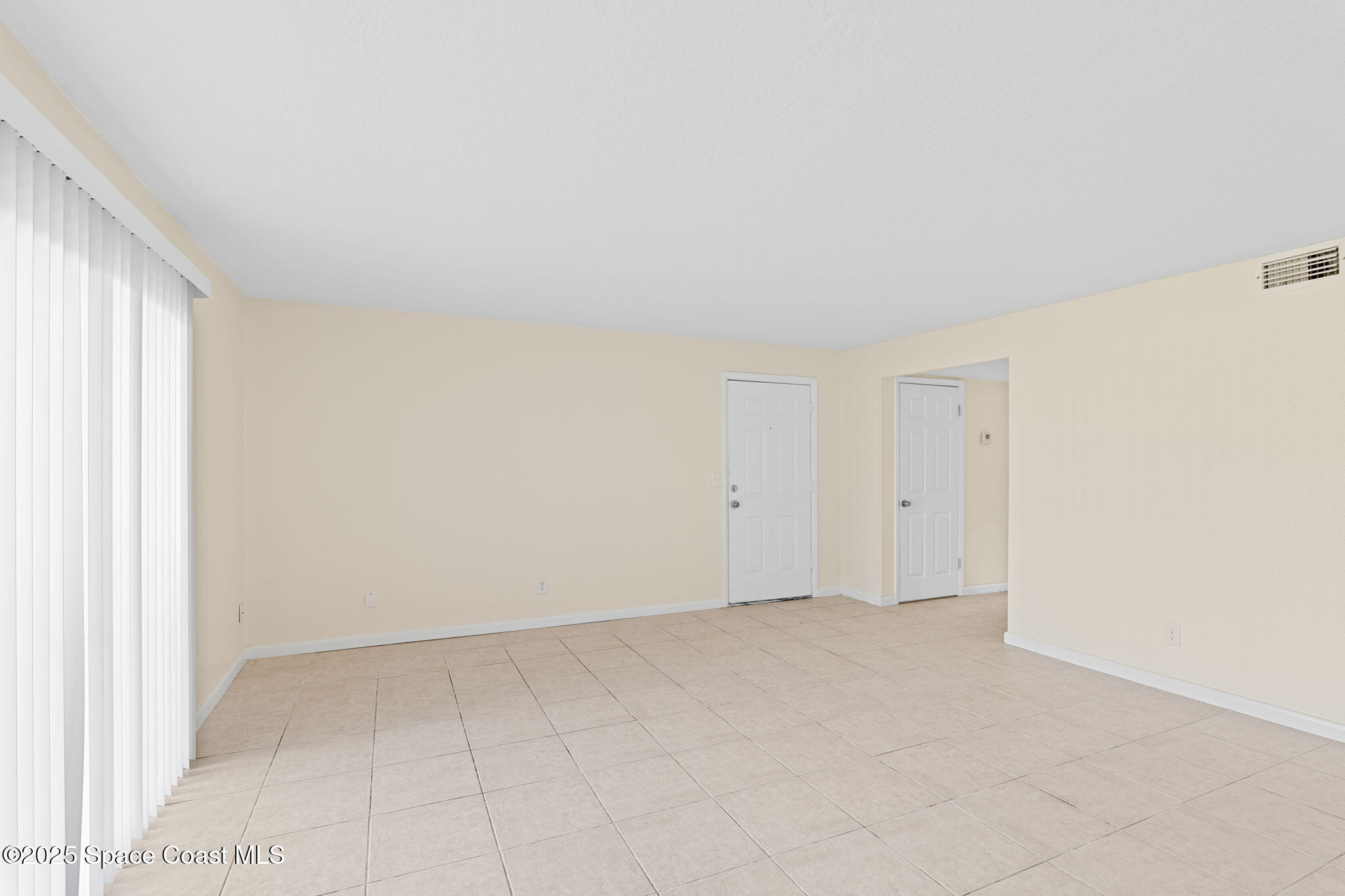 1870 Agora Circle Southeast, Unit 103 Palm Bay, FL 32909 - Photo 4 of 18 Living Room